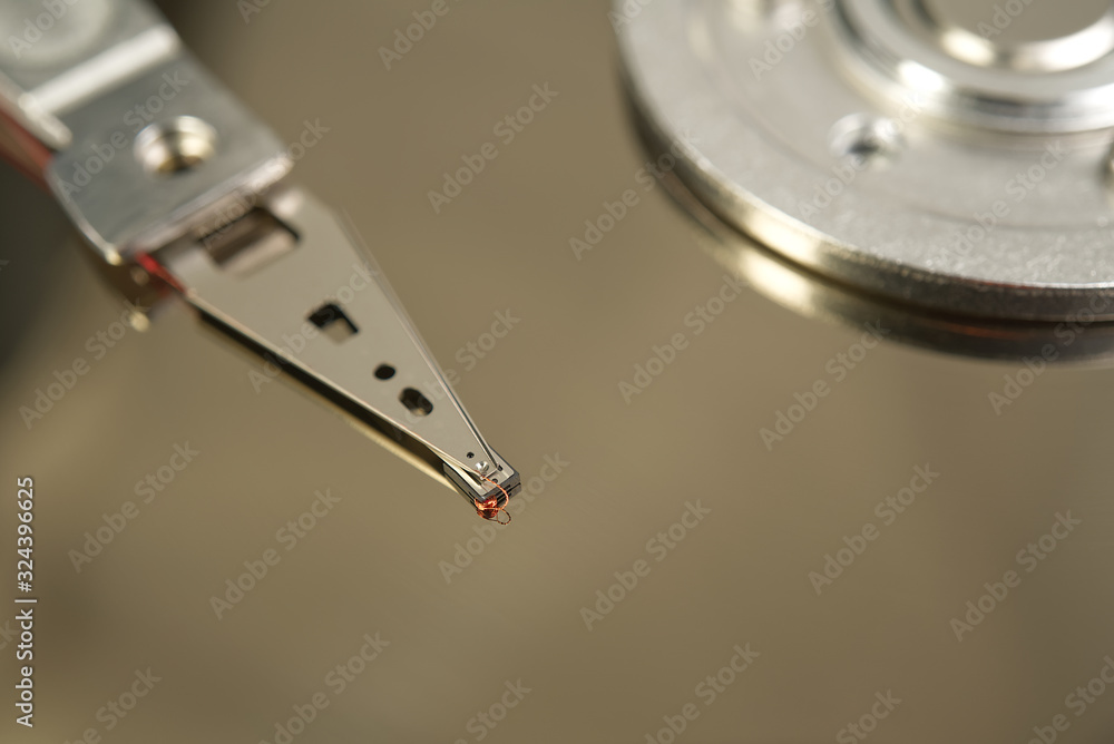 Poster detail of reading - writing head of hard drive. close up inside of hard disk drive - hdd . hard disk