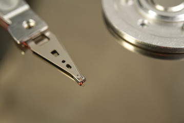 Detail of reading - writing head of hard drive. Close up inside of Hard disk drive - HDD . Hard...