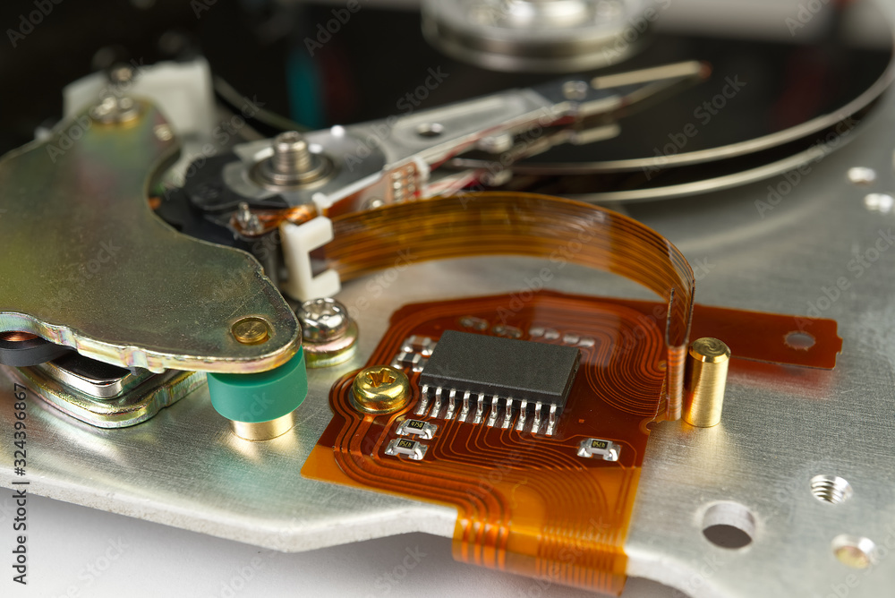 Poster detail of reading - writing head of hard drive. close up inside of hard disk drive - hdd . hard disk