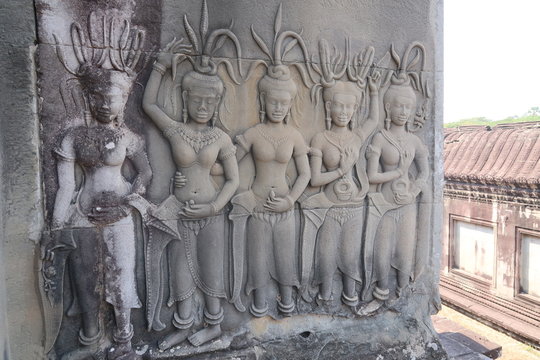 detailed picture of four well preserved shiva, hindu, religon murals, bas relief and one damaged, angkor wat