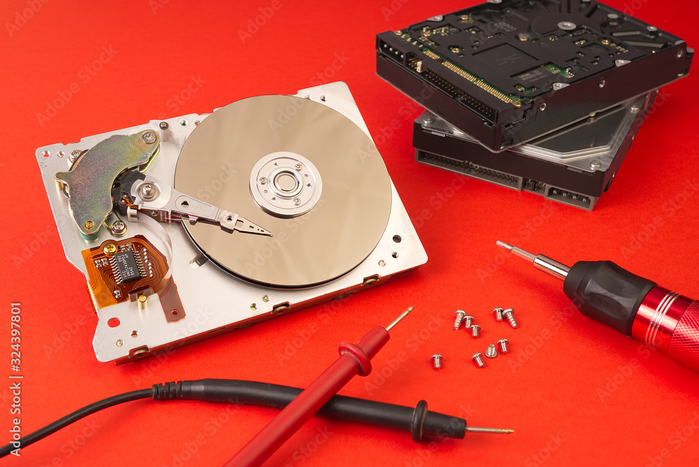 Poster hdd - hard disk drive. hard disk repair concept. the hard drive is designed to store data of all man