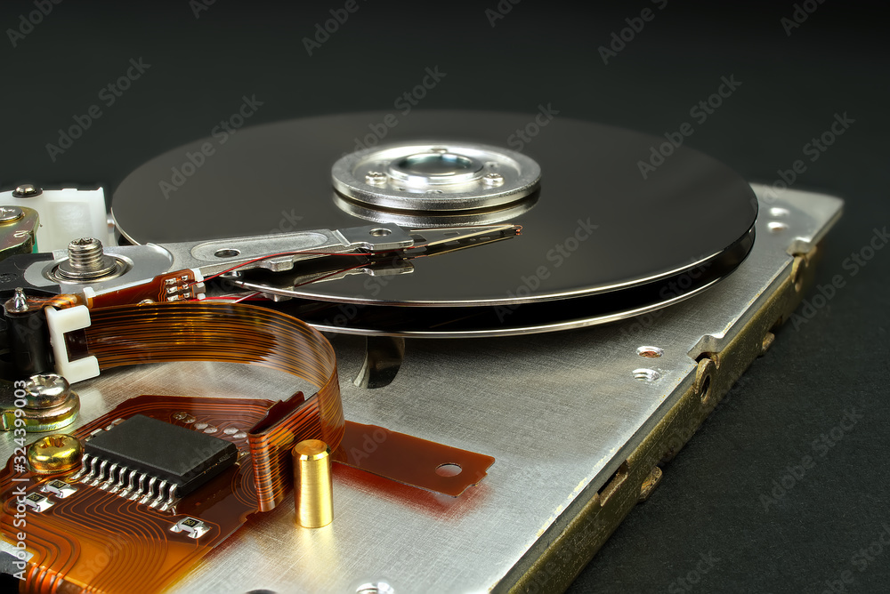 Poster detail of reading - writing head of hard drive. close up inside of hard disk drive - hdd . hard disk