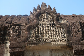 closeup of detail mural and bas relief in ancient angkor wat temple, hindu culture and religon in...