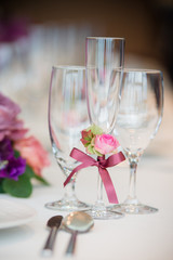 Wedding party, bride and groom with champagne flutes on wedding banquet