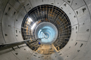 Construction of a new subway tunnel. Round tunnel with lighting