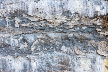 background. destruction of a stone wall