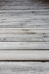Fototapeta na wymiar background. old wooden fence with peeling white paint.