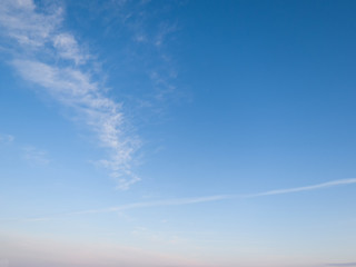 Fototapeta premium Light cirrus clouds in the blue sky