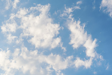 Blue sky with fluffy white cloud, Nature background
