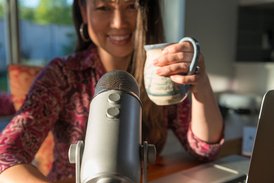 Podcaster with Microphone