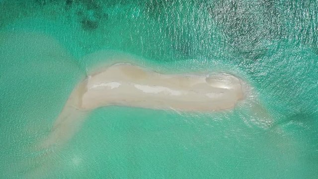 white sand beach, a sandbar in tropical maldives sea, on high tide, crystal clear waters, High angle orbital