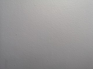 surface of the cement wall is rough, paint gray color in texture material concrete background