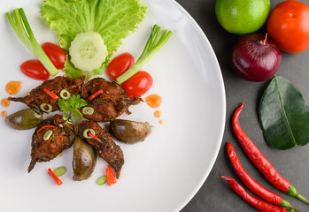 Spicy Fried Stir Catfish on white plate, Thai food.