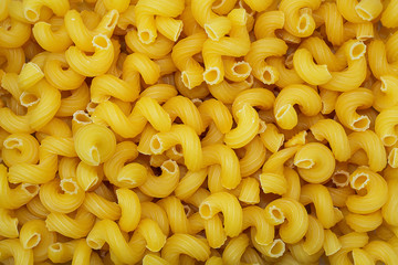 top view of raw macaroni texture background