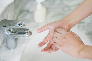 Hand features of Asian women washing their hands