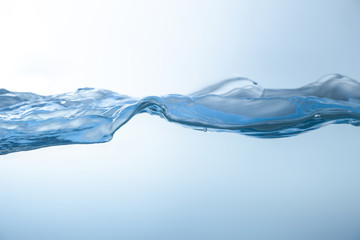 Water splash. Aqua flowing in waves and creating bubbles. Drops on the water surface feel fresh and...