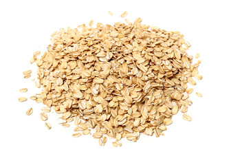 Oat flakes pile on white background 