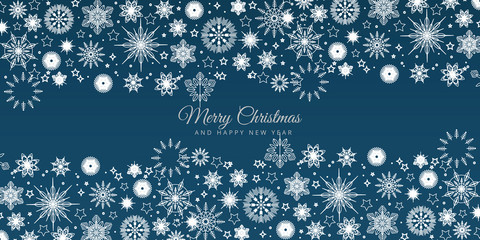 Blue Christmas background with snowflakes. Festive winter background
