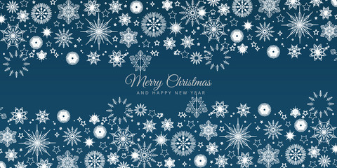 Blue Christmas background with snowflakes. Festive winter background