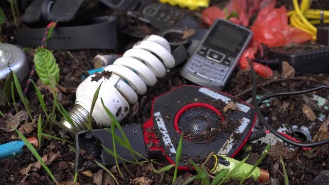 E-waste, computer equipment, circuit boards, mice, keyboards, and cell phones, batteries, lamps, scrap components. Soil and water pollution caused by hazardous chemicals and heavy metals
