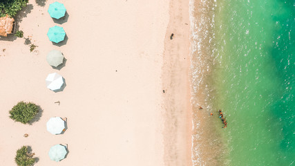 Fototapeta na wymiar Aerial drone, bird's eye view photo of Mawun beach, Lombok Island, Indonesia. White sandy beach, green hills, and blue sky. View of another side of Mandalika circuit in Lombok. Background.