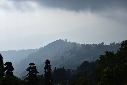 View From Mountains to the Valley Covered with Foggy. Foggy Landscape.