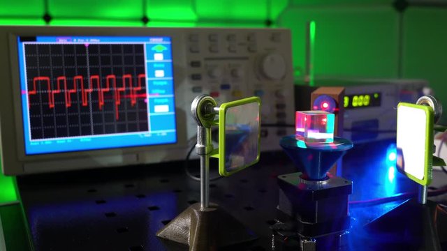  laser in a quantum optics lab. Semiconductor laser on optical table in a quantum physics optics lab.