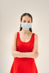 Woman wearing face mask protect filter pm2.5 anti pollution, anti smog and viruses. Air pollution,...
