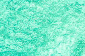 blue decorative plaster background , stucco wall with copyspace , color abstraction , wallpaper close up , azure ice macro , frozen winter texture