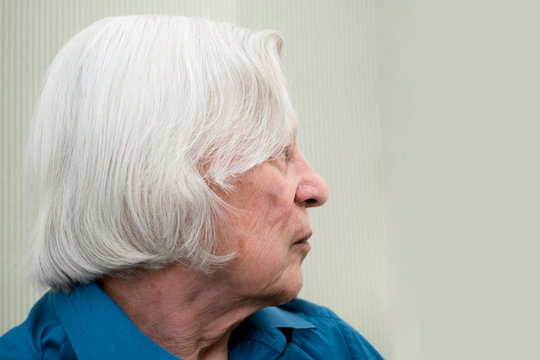 Aged Man With Long Gray Hair