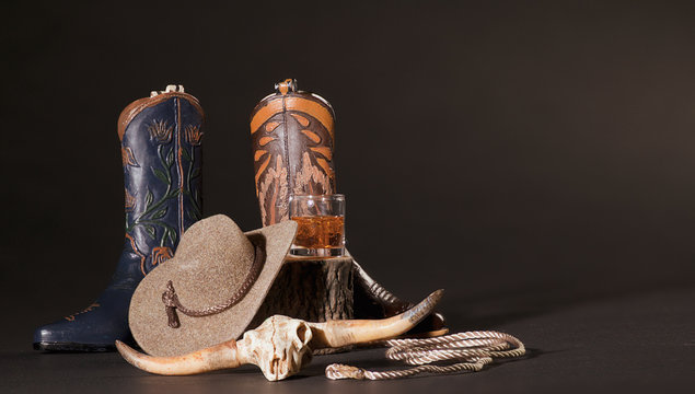 Blue and Tan Cowboy Boots, Whiskey,  Animal Skull, Cowboy Hat an