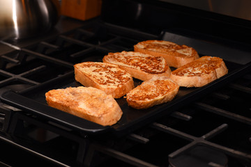 French Toast on griddle pan closeup