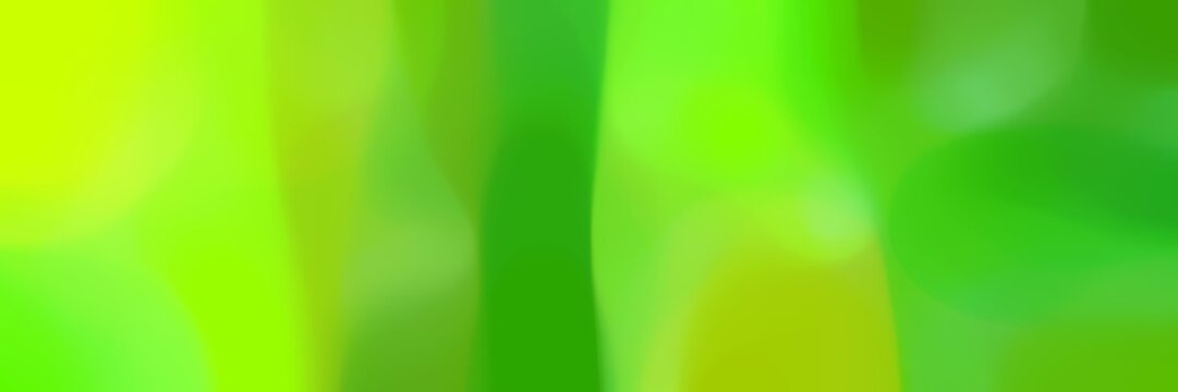 unfocused bokeh horizontal background texture with yellow green, lawn green and green yellow colors space for text or image