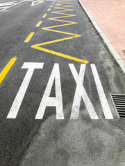 Closeup image of special lane for taxi painted on the road