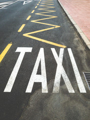 Toned photo of special parking place for taxin on the road
