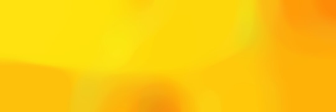 unfocused bokeh horizontal background with tangerine yellow, orange and gold colors space for text or image