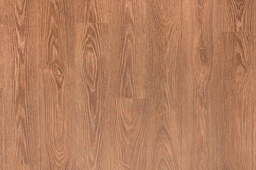 Natural dark brown wooden surface floor texture background.  polished  laminate  parquet