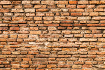Old brick wall background, old clay brick wall