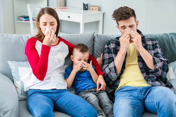 Family suffering from allergy at home
