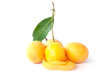 Peeled and whole ripe Marian Plum or Plum Mango Thai people call Ma Prang isolated on white background.