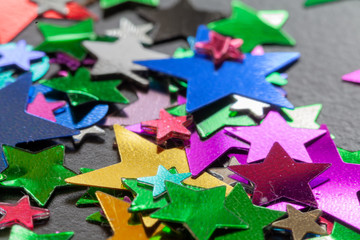 Fototapeta premium Confetti colourful shapes close up