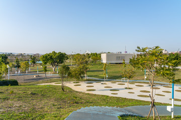 Fototapeta premium Taichung Central Park at the Shuinan Economic and Trade Area in blue sky sunny day. Former Shuinan Airport, lot of green space in here, the second largest park in Taiwan. Xitun District, Taichung City