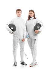 Young fencers on white background