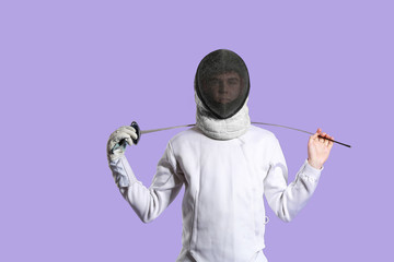 Young male fencer on color background