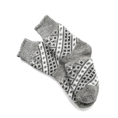 Knitted socks on white background