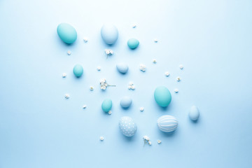 Beautiful Easter eggs on color background