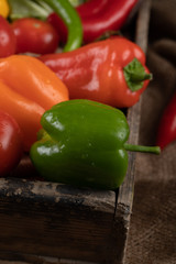 Red, yellow and green bell peppers.