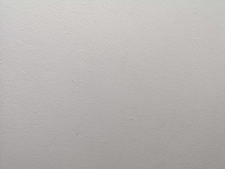 surface of the cement wall is rough, paint light gray color in texture material concrete background