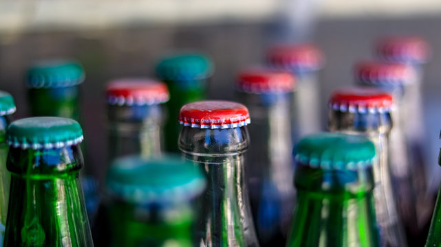 Red and Green Cap of a Carbonated Soft Drink