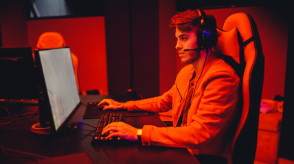 Team professional gamer playing winning tournaments online games computer © Parilov